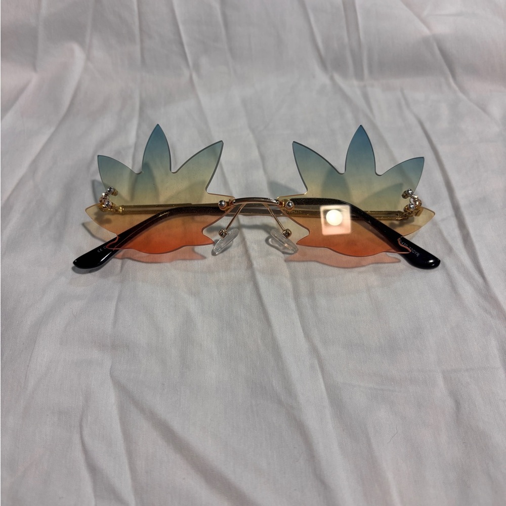 Pot Leaf Gradient Blue to Orange Rimless Sunglasses
